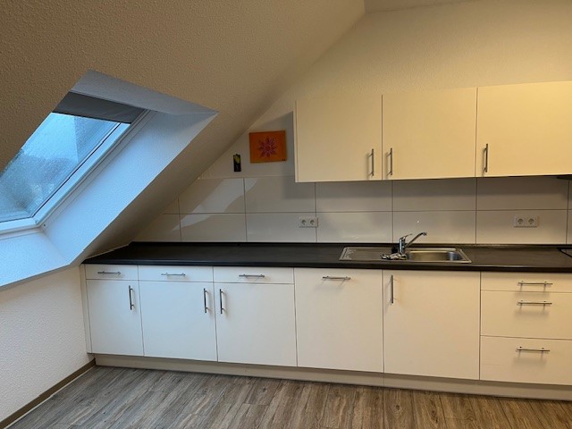 JA, zur 2-Zimmer-Seniorenmietwohnung mit Balkon, Einbauküche und TG-Stellplatz in Solingen-Ohligs! – Bild: 24235